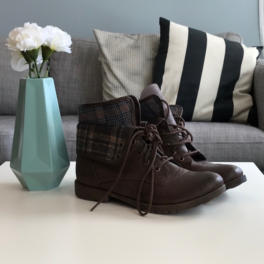 Cute combat boots with plaid detailing.